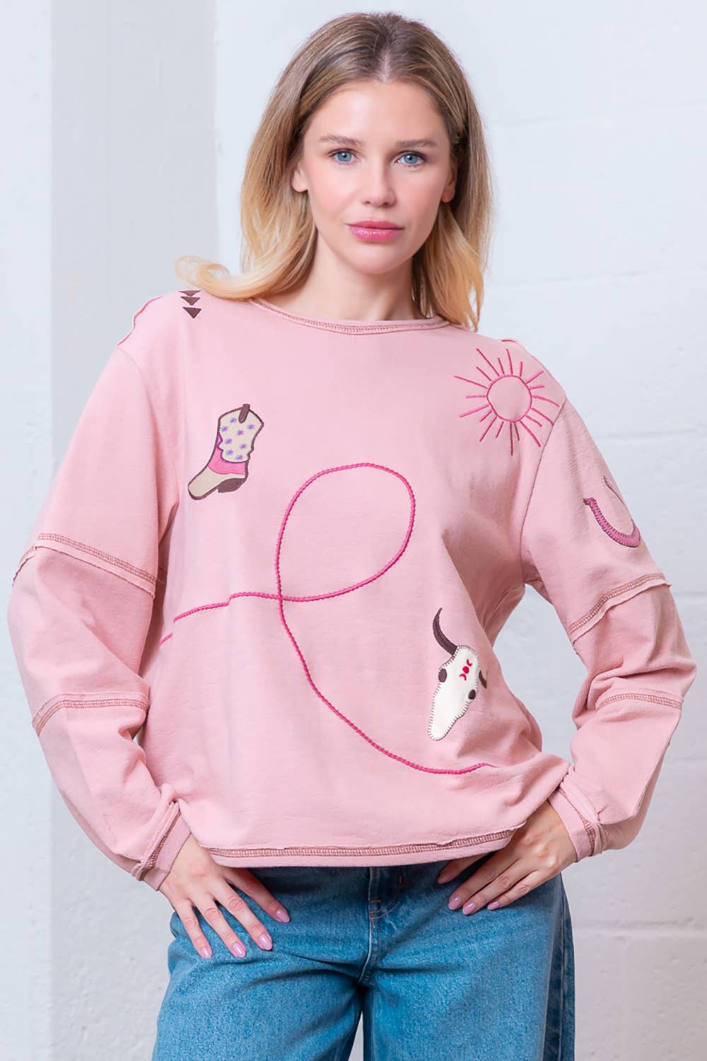 Taelynn "Outlaw" Western Embroidered Long-Sleeve Top — Soft Mauve Boat Neck with Exposed Seams Cowhide and Conchos
