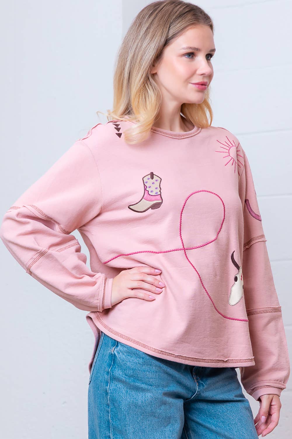 Taelynn "Outlaw" Western Embroidered Long-Sleeve Top — Soft Mauve Boat Neck with Exposed Seams Cowhide and Conchos
