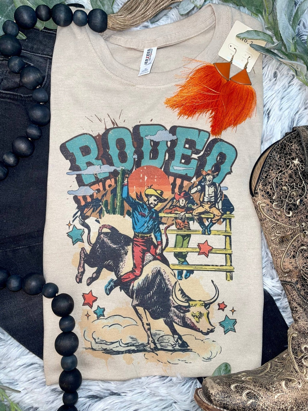 1/2 Penny "Vintage Rodeo Bull Rider" Western Graphic Tee — Sand Cotton-Blend Unisex Western Statement Cowhide and Conchos